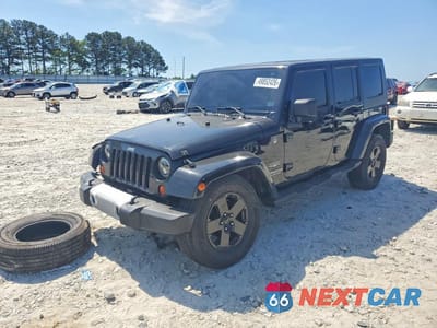 2010 JEEP WRANGLER UNLIMITED SAHARA 1J4HA5H15AL213434 - główne zdjęcie licytacji z USA - miniatura