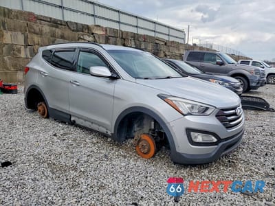 Czwarte zdjęcie samochodu z boku: 2014 HYUNDAI SANTA FE SPORT 2.4L VIN:5XYZUDLB4EG220288 - miniatura