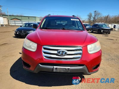 Piąte zdjęcie samochodu w środku: 2012 HYUNDAI SANTA FE GLS VIN:5XYZGDAB1CG129969 - miniatura
