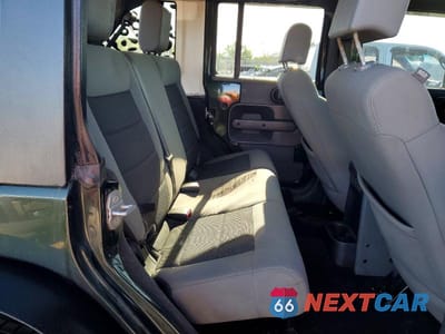 Zdjęcie 10 z 12 samochodu: 2010 JEEP WRANGLER UNLIMITED SPORT VIN:1J4HA3H12AL125218 - miniatura