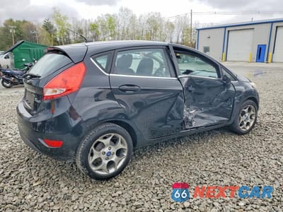 Trzecie zdjęcie samochodu z tyłu: 2011 FORD FIESTA VIN:3FADP4FJ5BM124260 - miniatura