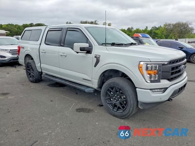 Czwarte zdjęcie samochodu z boku: 2023 FORD F150 SUPERCREW VIN:1FTFW1ED4PFA90044 - miniatura