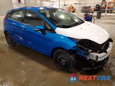 Czwarte zdjęcie samochodu z boku: 2016 FORD FIESTA SE VIN:3FADP4EJ0GM127155 - miniatura