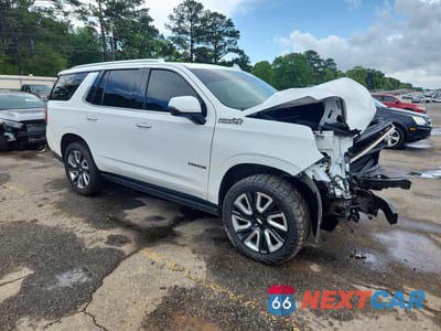 Czwarte zdjęcie samochodu z boku: 2021 CHEVROLET TAHOE K1500 HIGH COUNTRY VIN:1GNSKTKL9MR138611 - miniatura