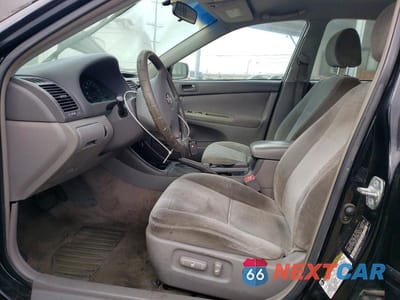 Zdjęcie 7 z 11 samochodu: 2004 TOYOTA CAMRY LE VIN:4T1BE32K94U323144 - miniatura