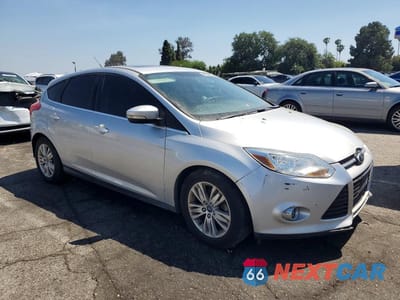 Czwarte zdjęcie samochodu z boku: 2012 FORD FOCUS SEL VIN:1FAHP3M22CL437471 - miniatura