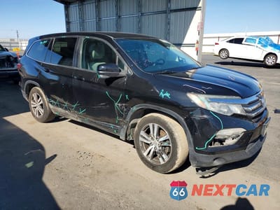 Czwarte zdjęcie samochodu z boku: 2016 HONDA PILOT EX VIN:5FNYF5H3XGB023164 - miniatura