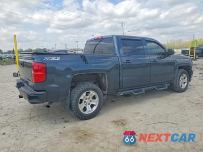Trzecie zdjęcie samochodu z tyłu: 2018 CHEVROLET SILVERADO K1500 LT VIN:3GCUKREC4JG233329 - miniatura