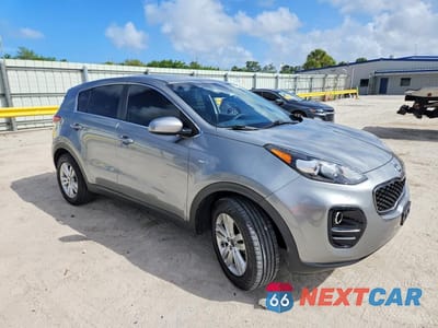 Czwarte zdjęcie samochodu z boku: 2019 KIA SPORTAGE LX VIN:KNDPMCAC2K7591875 - miniatura