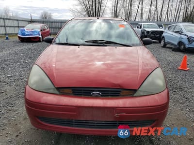 Piąte zdjęcie samochodu w środku: 2004 FORD FOCUS LX VIN:1FAFP33P14W132192 - miniatura