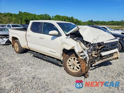 Czwarte zdjęcie samochodu z boku: 2025 TOYOTA TACOMA SR5 VIN:3TMLB5JN7SM114012 - miniatura
