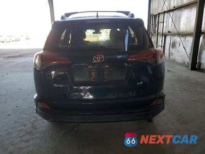 Zdjęcie 6 z 12 samochodu: 2018 TOYOTA RAV4 LE VIN:JTMZFREV1JJ749805 - miniatura