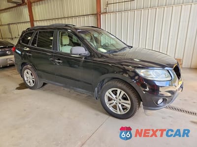 Czwarte zdjęcie samochodu z boku: 2012 HYUNDAI SANTA FE LIMITED VIN:5XYZKDAG0CG135725 - miniatura