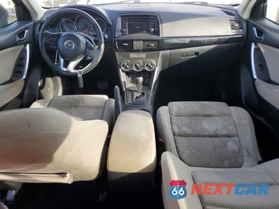 Zdjęcie 8 z 13 samochodu: 2013 MAZDA CX-5 TOURING VIN:JM3KE4CE8D0141372 - miniatura
