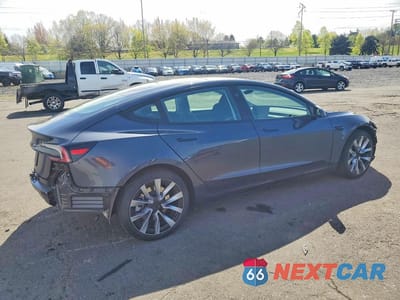 Trzecie zdjęcie samochodu z tyłu: 2025 TESLA MODEL 3 VIN:5YJ3E1EA4SF001856 - miniatura