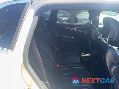 Zdjęcie 6 z 10 samochodu: 2016 LINCOLN MKX RESERVE VIN:2LMPJ8LP8GBL40590 - miniatura