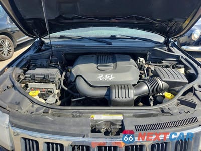 Zdjęcie 12 z 13 samochodu: 2012 JEEP GRAND CHEROKEE LAREDO VIN:1C4RJFAG1CC222049 - miniatura