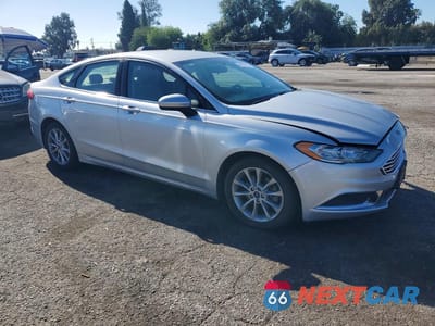 Czwarte zdjęcie samochodu z boku: 2017 FORD FUSION SE HYBRID VIN:3FA6P0LU1HR266116 - miniatura