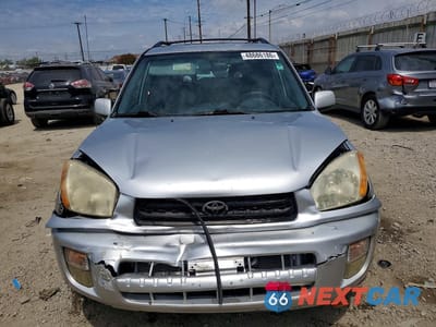 Piąte zdjęcie samochodu w środku: 2003 TOYOTA RAV4 BASE VIN:JTEGH20V630110128 - miniatura