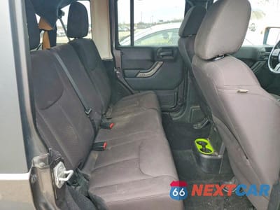 Zdjęcie 11 z 14 samochodu: 2014 JEEP WRANGLER UNLIMITED SPORT VIN:1C4HJWDG4EL298813 - miniatura