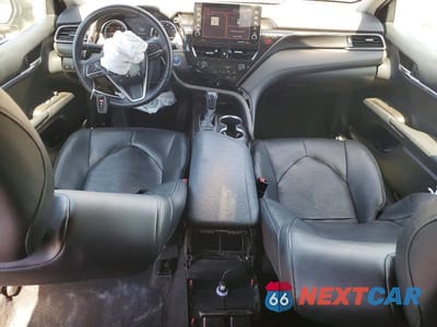 Zdjęcie 8 z 13 samochodu: 2022 TOYOTA CAMRY HYBRID XLE VIN:4T1F31AK3NU574899 - miniatura