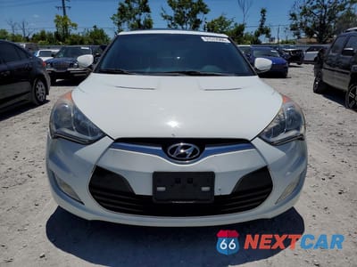 Piąte zdjęcie samochodu w środku: 2012 HYUNDAI VELOSTER BASE VIN:KMHTC6AD0CU053766 - miniatura