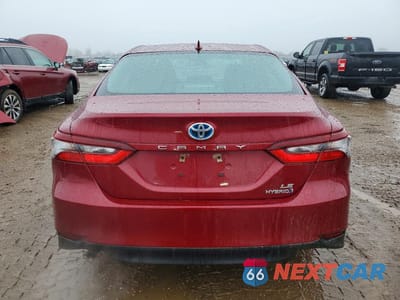 Zdjęcie 6 z 12 samochodu: 2021 TOYOTA CAMRY HYBRID LE VIN:4T1C31AKXMU031115 - miniatura