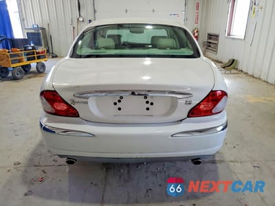 Zdjęcie 6 z 12 samochodu: 2003 JAGUAR X-TYPE VIN:SAJEA51D03XD22994 - miniatura