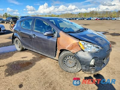 Czwarte zdjęcie samochodu z boku: 2014 TOYOTA PRIUS C TWO VIN:JTDKDTB39E1568853 - miniatura
