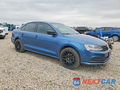 Czwarte zdjęcie samochodu z boku: 2016 VOLKSWAGEN JETTA S VIN:3VW267AJ4GM393724 - miniatura