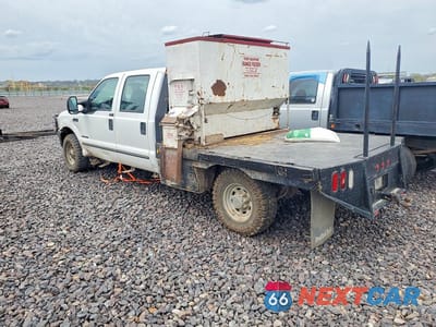 Drugie zdjęcie samochodu z przodu: 1999 FORD F350 SUPER DUTY FLATBED TRUCK VIN:1FTSW31F1XEE65931 - miniatura