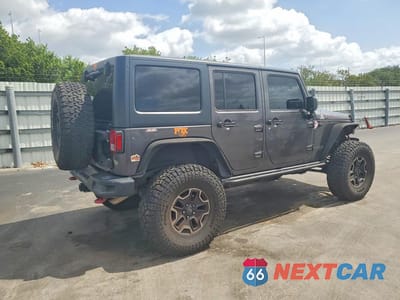 Trzecie zdjęcie samochodu z tyłu: 2016 JEEP WRANGLER UNLIMITED RUBICON VIN:1C4BJWFG4GL251951 - miniatura
