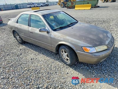 Czwarte zdjęcie samochodu z boku: 1999 TOYOTA CAMRY LE VIN:JT2BG28K2X0343353 - miniatura