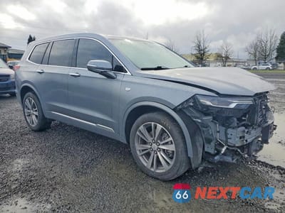 Czwarte zdjęcie samochodu z boku: 2022 CADILLAC XT6 PREMIUM LUXURY VIN:1GYKPDRS4NZ107677 - miniatura