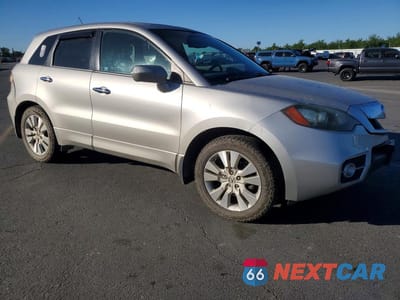 Czwarte zdjęcie samochodu z boku: 2010 ACURA RDX VIN:5J8TB2H22AA003584 - miniatura