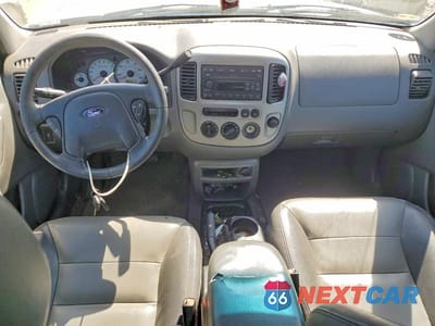Zdjęcie 8 z 13 samochodu: 2003 FORD ESCAPE XLT VIN:1FMYU03193KA42229 - miniatura