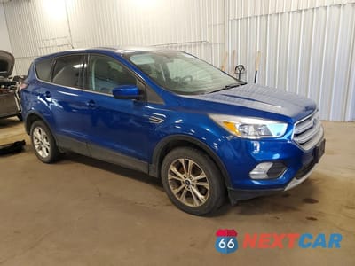 Czwarte zdjęcie samochodu z boku: 2017 FORD ESCAPE SE VIN:1FMCU9GD6HUC26042 - miniatura