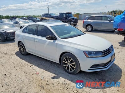 Czwarte zdjęcie samochodu z boku: 2018 VOLKSWAGEN JETTA SE VIN:3VWDB7AJ8JM261707 - miniatura