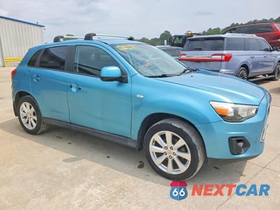 Czwarte zdjęcie samochodu z boku: 2014 MITSUBISHI OUTLANDER SPORT ES VIN:4A4AP3AU4EE031581 - miniatura