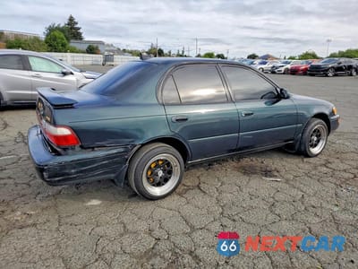 Trzecie zdjęcie samochodu z tyłu: 1997 TOYOTA COROLLA DX VIN:1NXBB02E5VZ588419 - miniatura