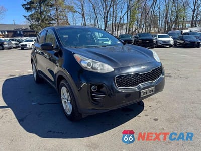 Czwarte zdjęcie samochodu z boku: 2017 KIA SPORTAGE LX VIN:KNDPMCACXH7077250 - miniatura