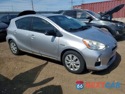 Czwarte zdjęcie samochodu z boku: 2013 TOYOTA PRIUS C TWO VIN:JTDKDTB31D1550524 - miniatura