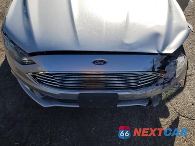 Zdjęcie 11 z 12 samochodu: 2017 FORD FUSION SE HYBRID VIN:3FA6P0LU1HR266116 - miniatura