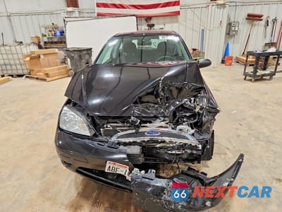 Piąte zdjęcie samochodu w środku: 2006 FORD FOCUS ZX3 VIN:1FAFP31N86W152721 - miniatura