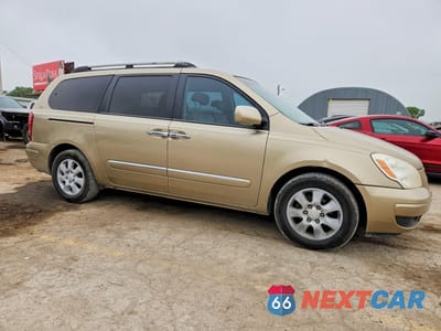 Czwarte zdjęcie samochodu z boku: 2007 HYUNDAI ENTOURAGE GLS VIN:KNDMC233376031454 - miniatura