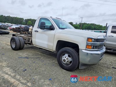 Czwarte zdjęcie samochodu z boku: 2016 CHEVROLET SILVERADO TRUCK CAB AND CHASSIS VIN:1GB3CYCG0GZ295638 - miniatura