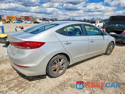Trzecie zdjęcie samochodu z tyłu: 2018 HYUNDAI ELANTRA VALUE EDITION VIN:5NPD84LF5JH214018 - miniatura