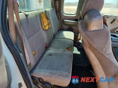 Zdjęcie 10 z 12 samochodu: 2001 FORD F150 VIN:1FTRX17W01NA87728 - miniatura