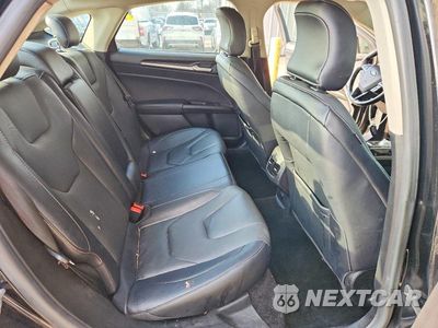 Zdjęcie 10 z 12 samochodu: 2018 FORD FUSION TITANIUM VIN:3FA6P0D92JR205664 - miniatura