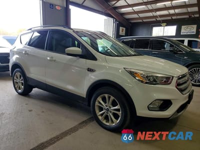 Czwarte zdjęcie samochodu z boku: 2017 FORD ESCAPE SE VIN:1FMCU9GD2HUE98376 - miniatura